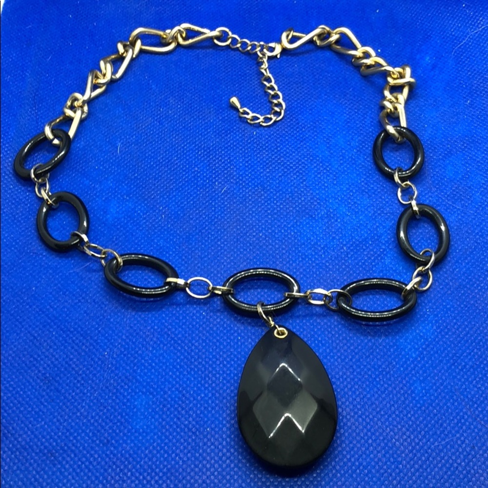 Necklace with large black pear shape bead